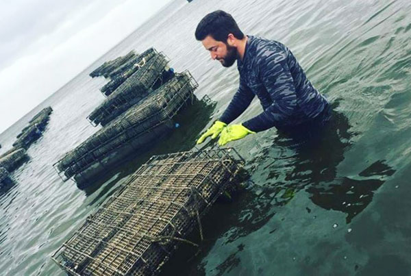 Lew Childre farming oysters in Gulf Shores, Alabama