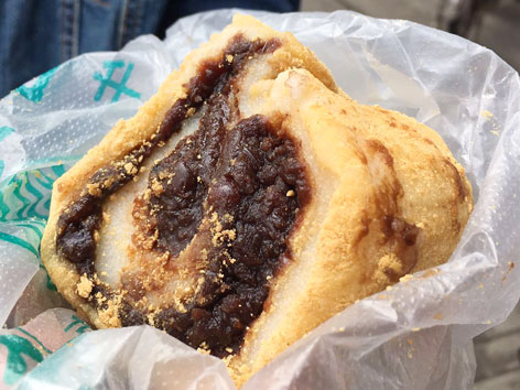 Ludagun, a sweet sticky rice cake with bean filling, from a bakery in Beijing