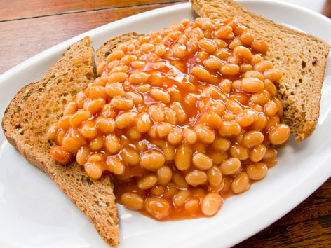 A plate of British beans on toast from a cafe in London, England.