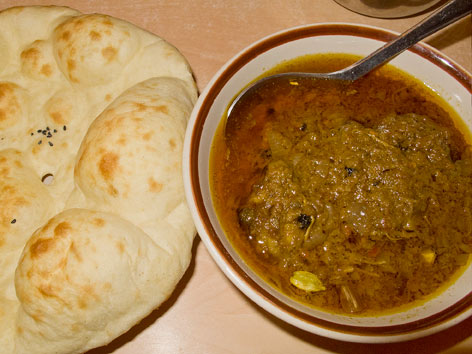 Chicken ishtu and tandoori roti from Purani Dilli in Delhi, India.