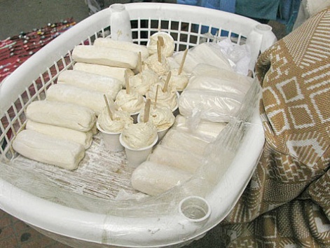A basket filled with gelatina sold on the street of Bogota, Colombia.